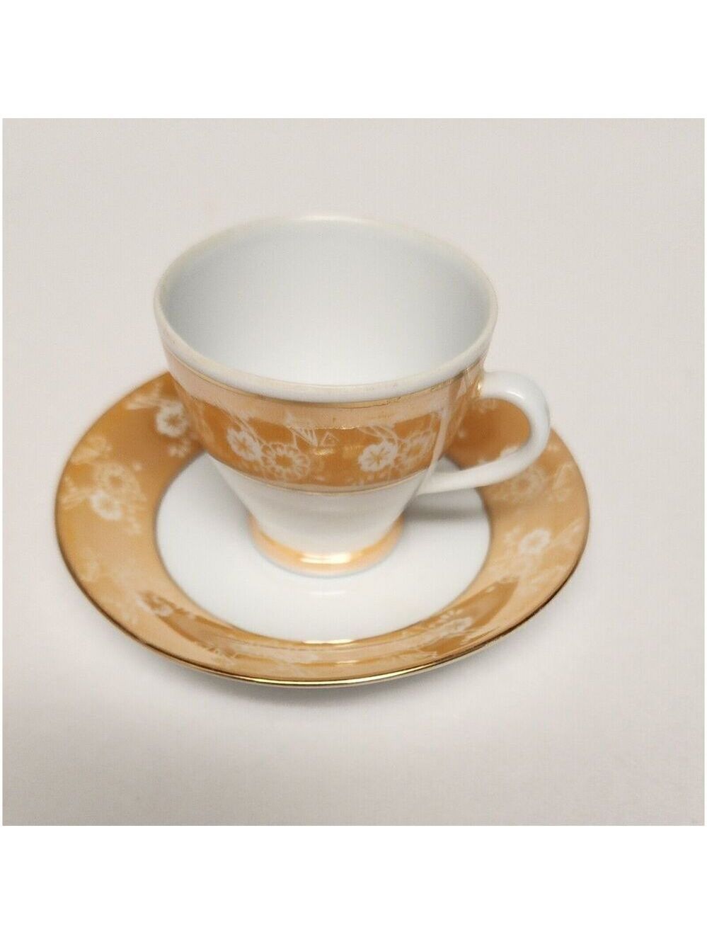 FOOTED MINITURE TEACUP AND SAUCER SET YELLOW W/ GOLD TRIM